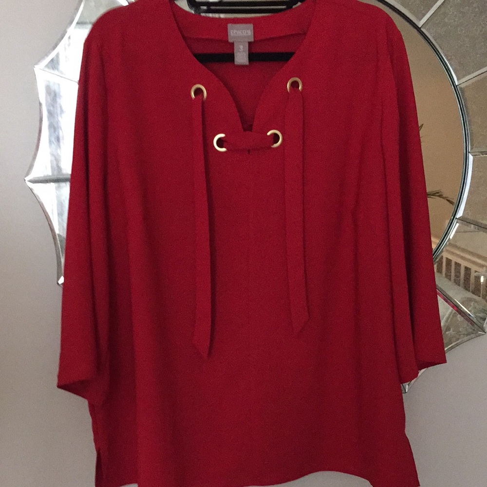 CHICO’S red with gold grommets & tie top